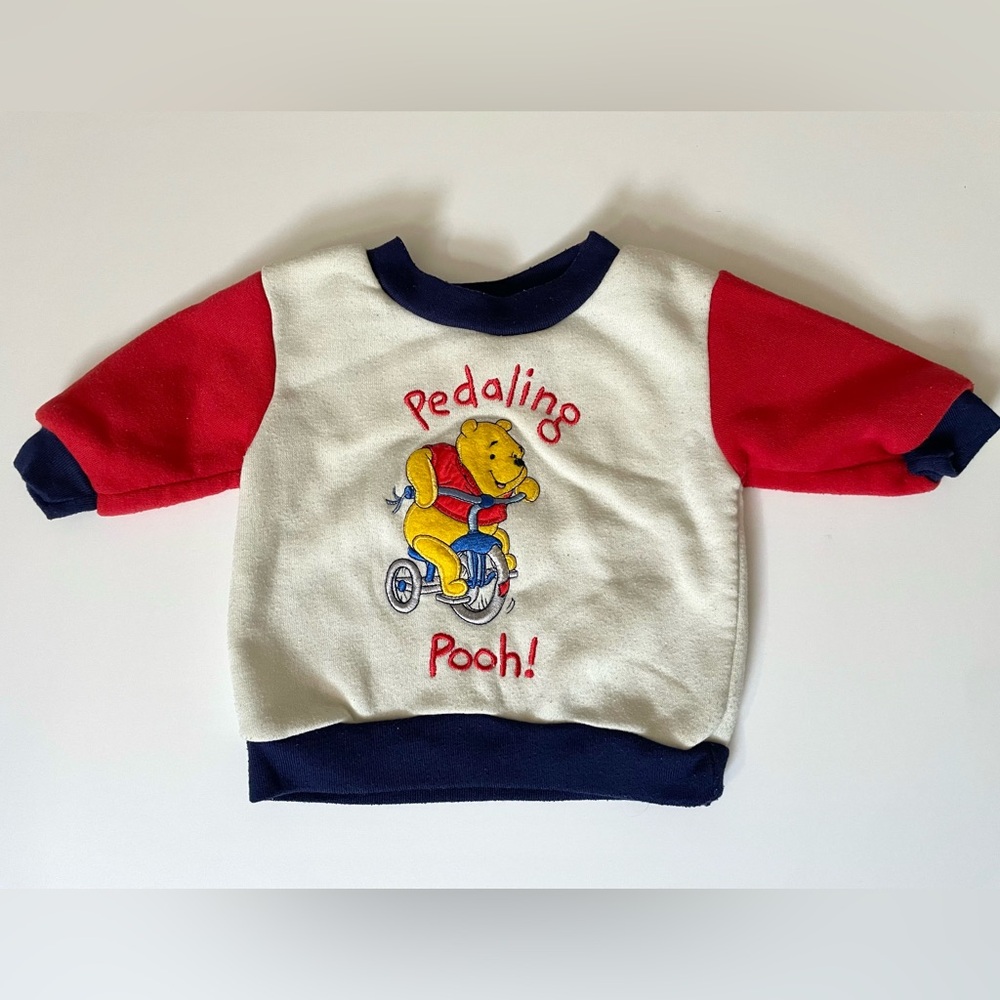 Vintage Winnie the Pooh 3-6 month “Pedaling Pooh” Baby Sweatshirt White Blue Red